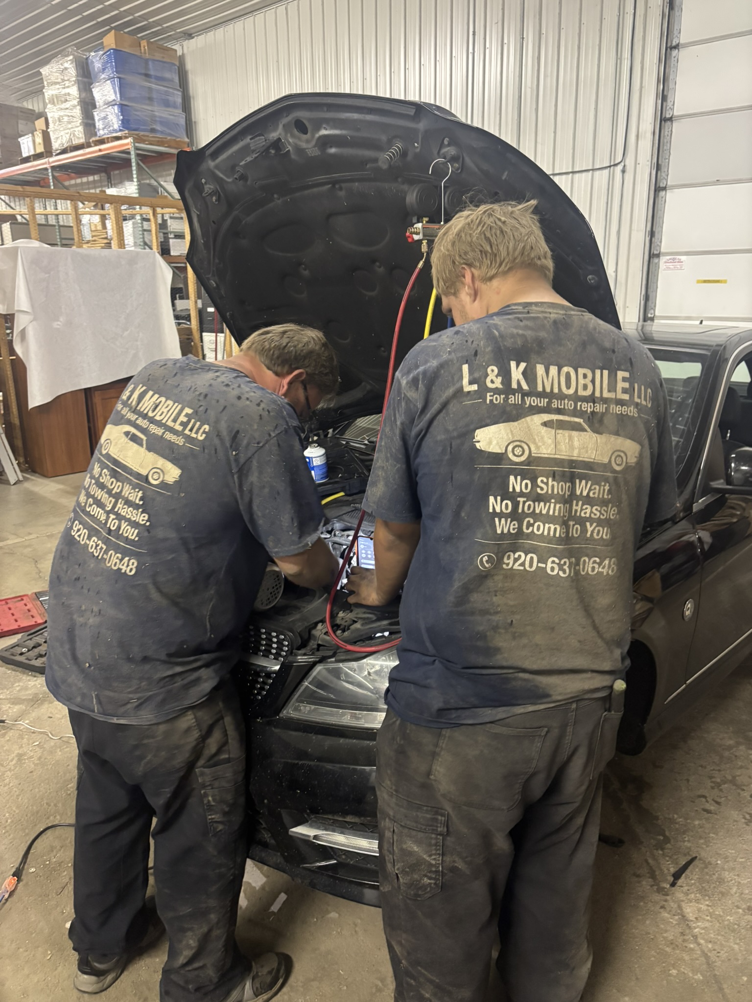 L and K Mobile mechanics working together