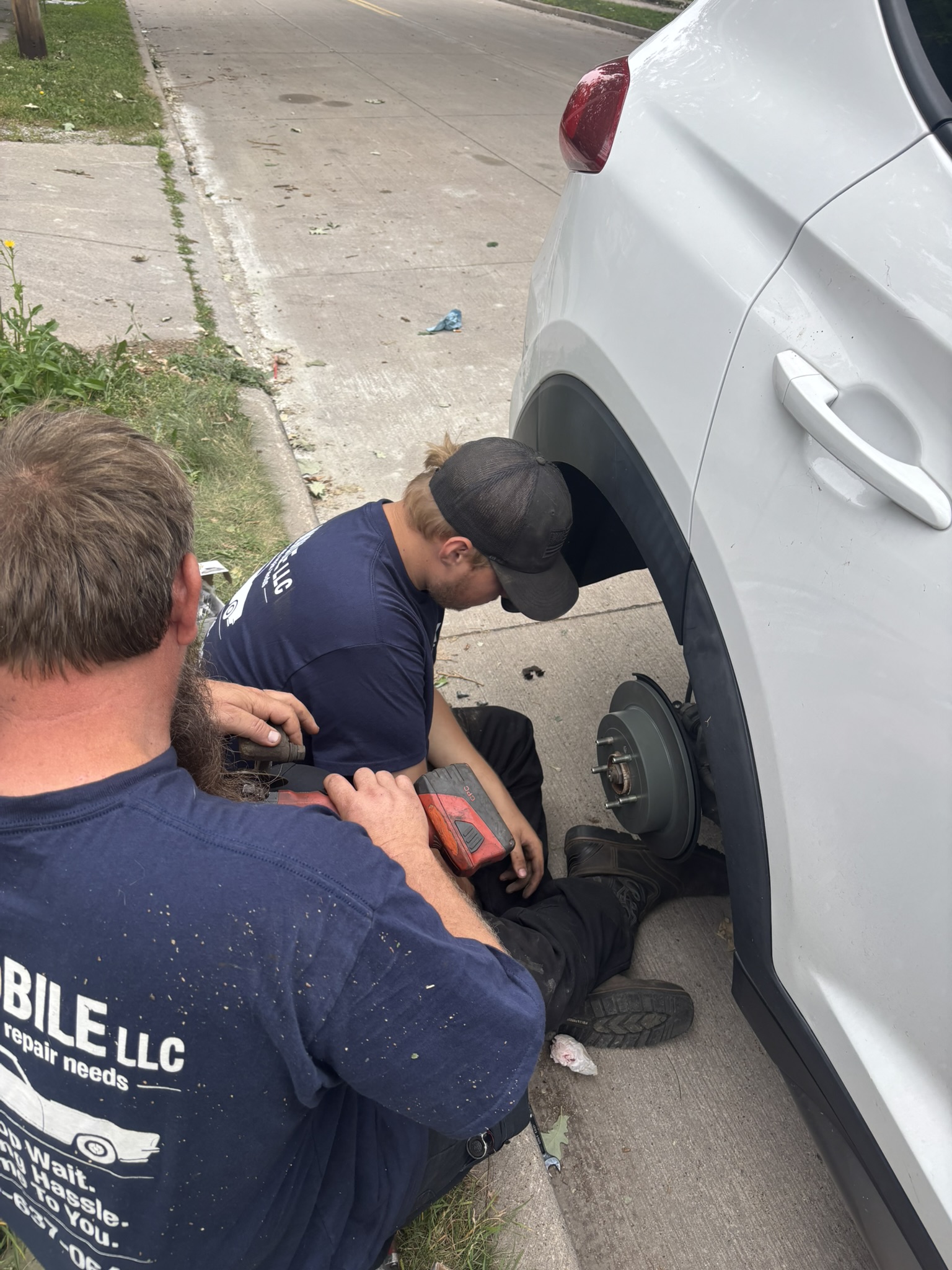 L and K Mobile mechanics completing a mobile brake repair